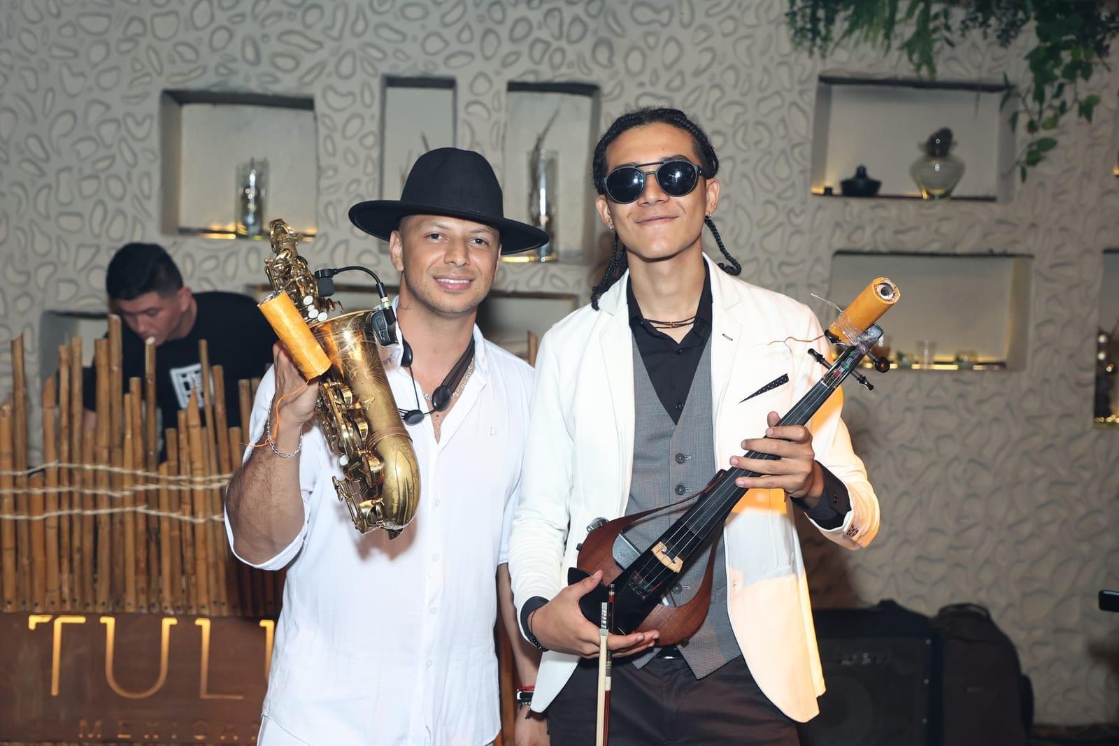 Show violin y saxofon